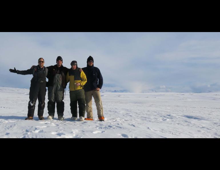 Ben Jones, Guido Grosse, Chris Arp, and Ned Rozell posing for a picture in the arctic.