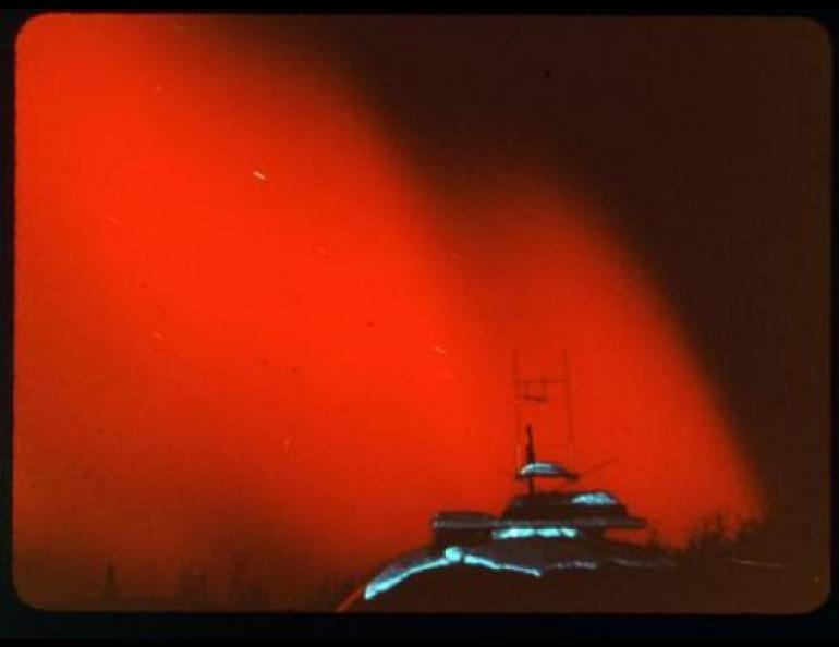 A rare red aurora over Alaska in February 1958. Geophysical Institute photo.