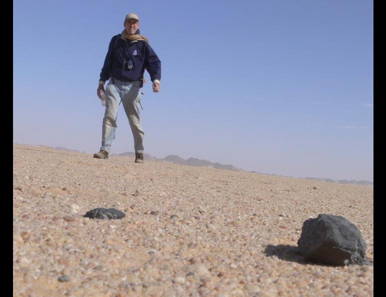 Peter Jenniskens, a meteor astronomer with the SETI (Search for Extraterrestrial Intelligence) institute, is here pictured with meteorite pieces he found in Sudan in 2008. He is now on a similar search in the Alaska wilderness. Photo courtesy Peter Jenniskens.