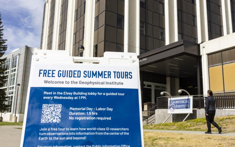A sign welcomes visitors for free guided summer tours of the Geophysical Institute, which start at the Elvey Building on UAF's West Ridge. UAF/GI photo by JR Ancheta.