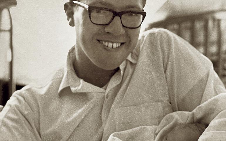 Neal Brown in 1967, holding his newborn son Kris. Photo courtesy Kris Brown.