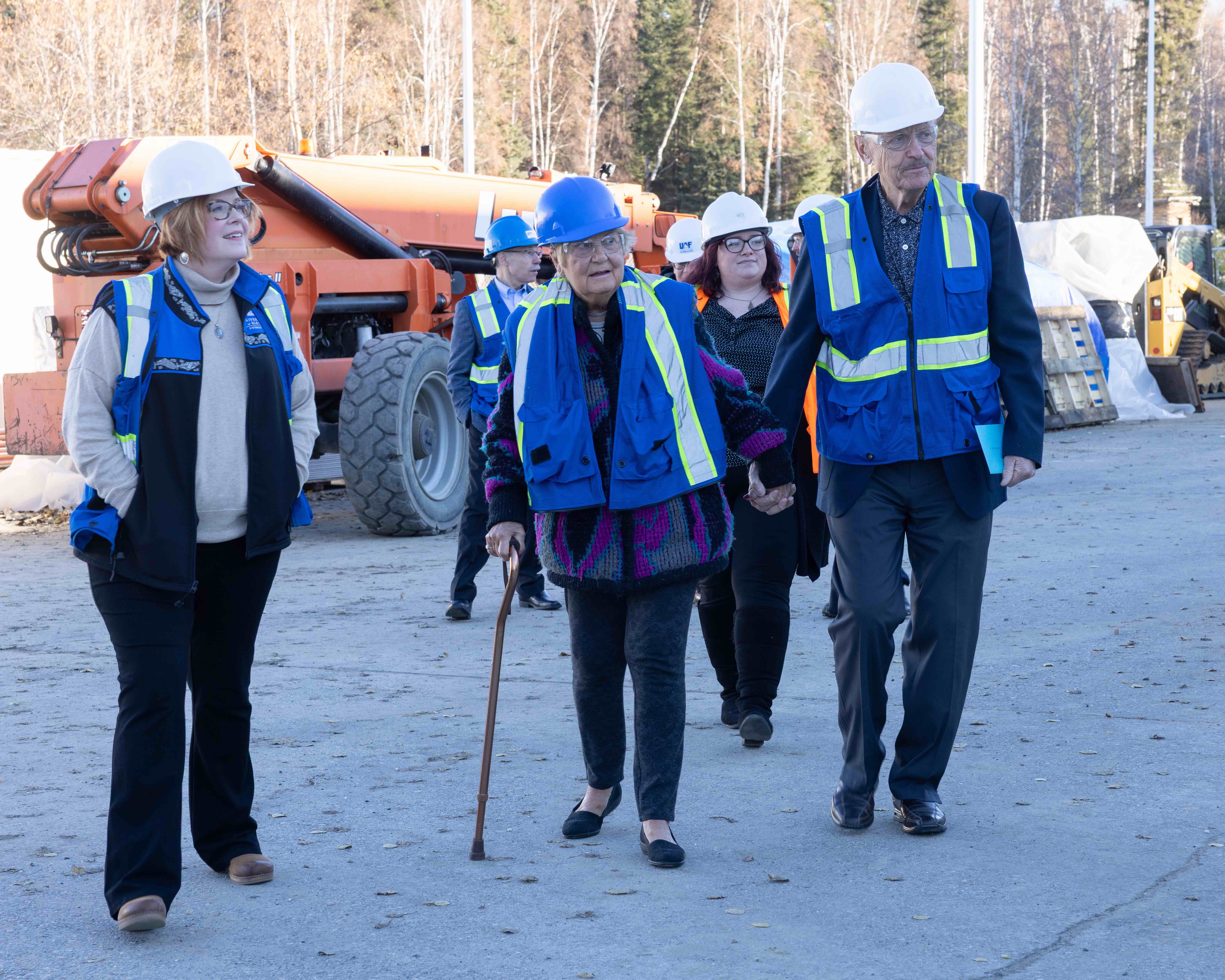 Marita and Walt Babula walk hand in hand Oct. 11, 2025, at the site of a 65-seat planetarium. The Babulas made a previously anonymous donation of $7.4 million to the project. Photo by Bryan Whitten