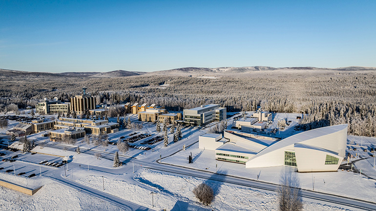 The West Ridge research area at the University of Alaska Fairbanks is nestled against the frosted woodlands in November. Photo by Eric Marshall
