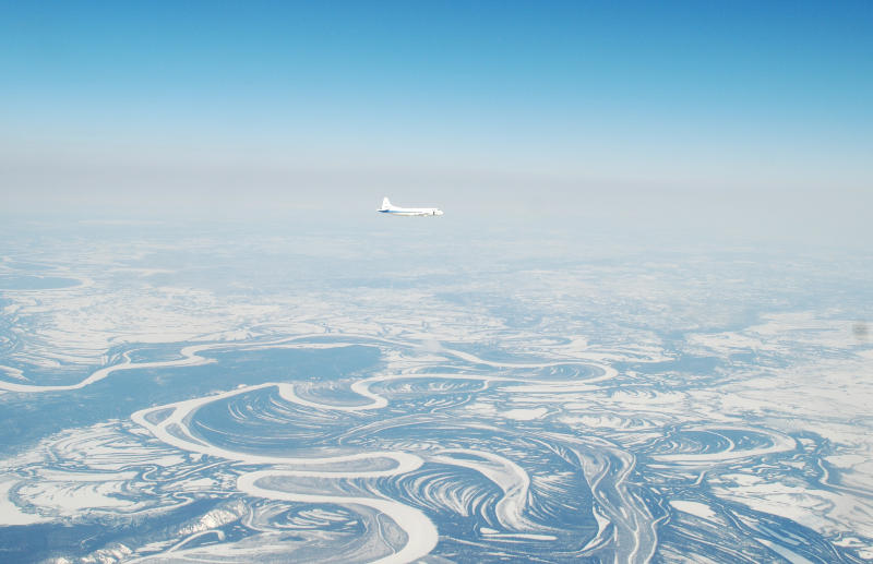 Plane flying over arctic haze 