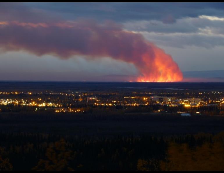 A smoke plume rises from the 2012 Dry Creek Fire, as seen from UAF’s West Ridge. Photo courtesy Geophysical Institute.