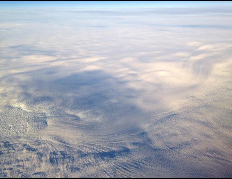 The trunk and terminus of Jakobshavn Isbræ discharge into Ilulissat Fjord. While this outlet glacier and many others have experienced rapid acceleration during the past two decades, most of the ice sheet interior has decelerated during the past 9,000 years. Photo by Timothy Bartholomaus.