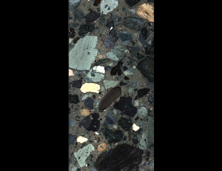 A portion of the drilled cores from the rocks that filled the crater left by the asteroid impact that wiped out the dinosaurs. The reports that the impact vaporized these rocks forming sulfate aerosols in the atmosphere, causing global cooling. Photo by the International Ocean Discovery Program.