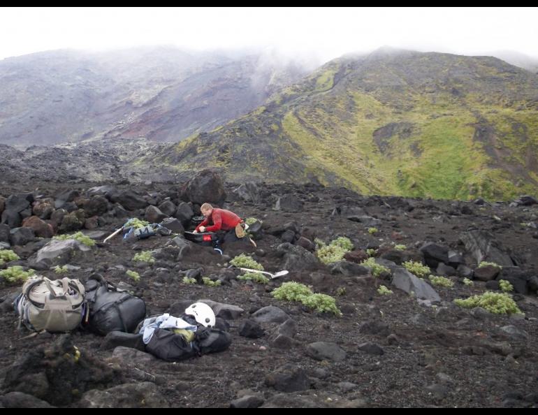 Pete Stelling, formerly of Western Washington University, assembles a seismic station on Cleveland Volcano in August 2015. Photo by Diana Roman.