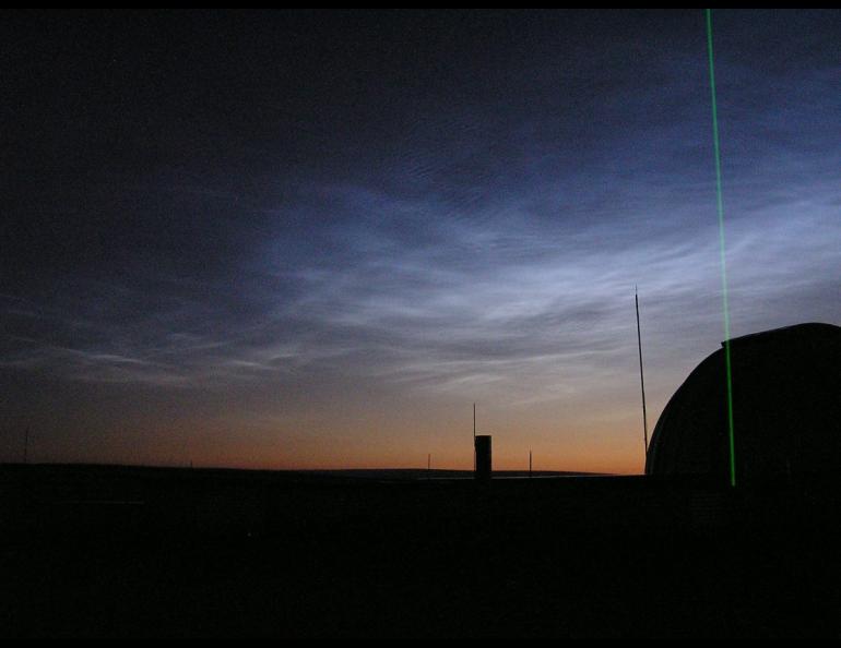 Polar mesospheric clouds float high above Poker Flat Research Range in 2005. Photo courtesy of Richard Collins.