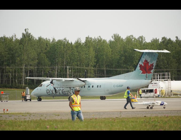 ACUASI personnel prep the SeaHunter for flight at the Mike Zubko Airport in Inuvik. Photo courtesy of the Alaska Center for Unmanned Aircraft Systems Integration.