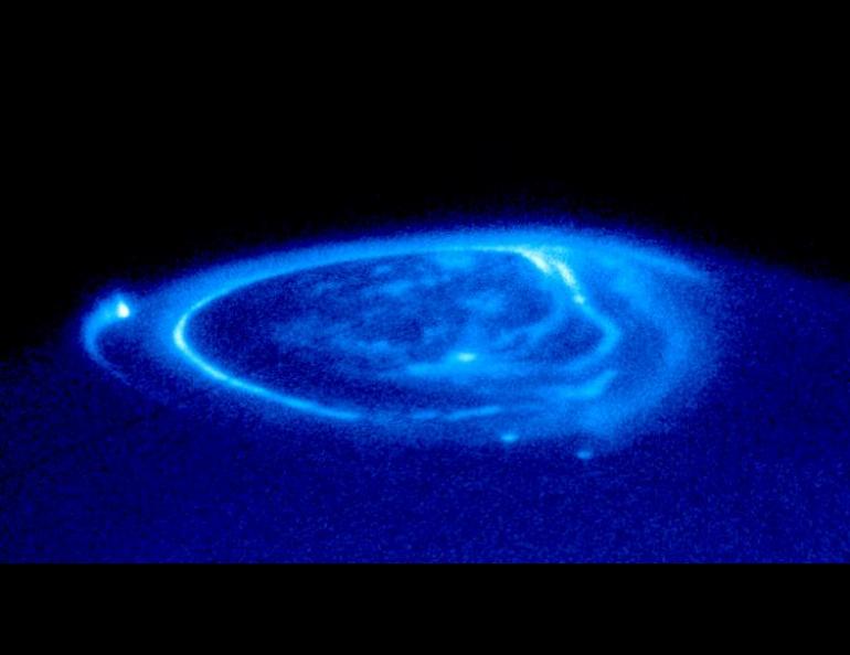 NASA's Hubble Space Telescope made this close-up view of an electric-blue aurora that is eerily glowing one half billion miles away on the giant planet Jupiter in 2010.