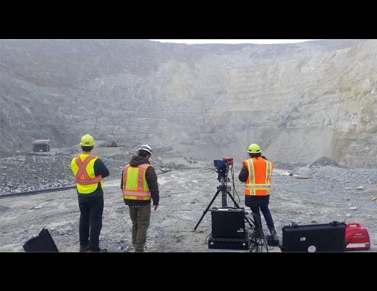 Field scans being made of exposures at Fort Knox Mine northeast of Fairbanks. The scans serve as additional ground validation for airborne hyperspectral data. Photo: Geophysical Institute 