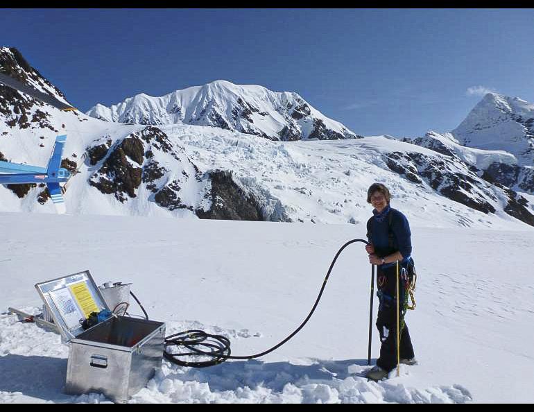 Regine Hock at work drilling a hole in the Alaska Range. Photo courtesy Regine Hock.