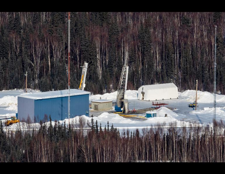 The two rockets for the Ion-Neutral Coupling during Active Aurora mission are seen elevated on the Poker Flat Research Range launch pad.  The rockets are enclosed in insulation to keep the motors and payload warm while awaiting launch. Photo by NASA/Terry Zaperach