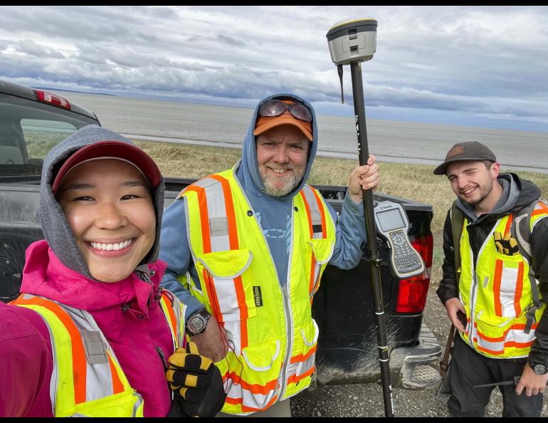 From left, Roberta Glenn, Chris Maio and Reyce Bogardus pause for a self portrait while surveying in Pilot Point, Alaska, in June 2021. UAF/GI photo by Roberta Glenn.