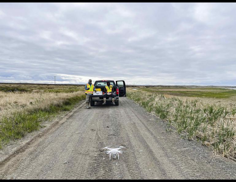 Graduate student Reyce Bogardus and associate professor Chris Maio use an unmanned aerial vehicle to take hundreds of photos that are stitched together to create a 3D elevation model. UAF/GI photo by Roberta Glenn.