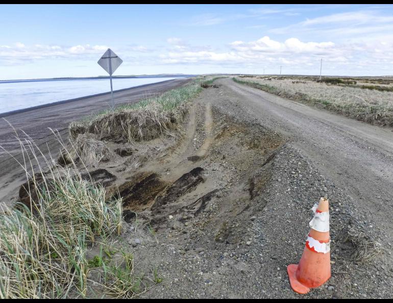 A portion of the road to the waterfront bulkhead in Pilot Pilot point erodes on Feb. 4, 2021. UAF/GI photo by Roberta Glenn.