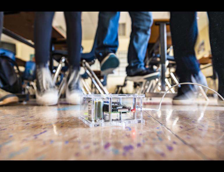 West Valley High School students in Fairbanks simulate an earthquake by jumping up and down next to a Raspberry Shake seismometer Monday, March 6, 2022. UAF/GI photo by JR Ancheta.