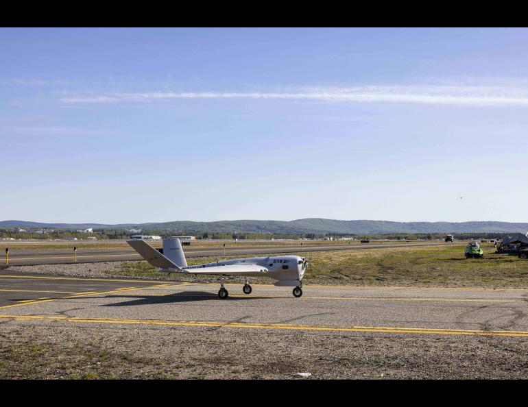 The Sentry unmanned aircraft of the UAF Alaska Center for Unmanned Aircraft Systems Integration on the taxiway at Fairbanks International Airport on Sunday, May 22, 2022. Photo by JR Ancheta/UAF Geophysical Institute