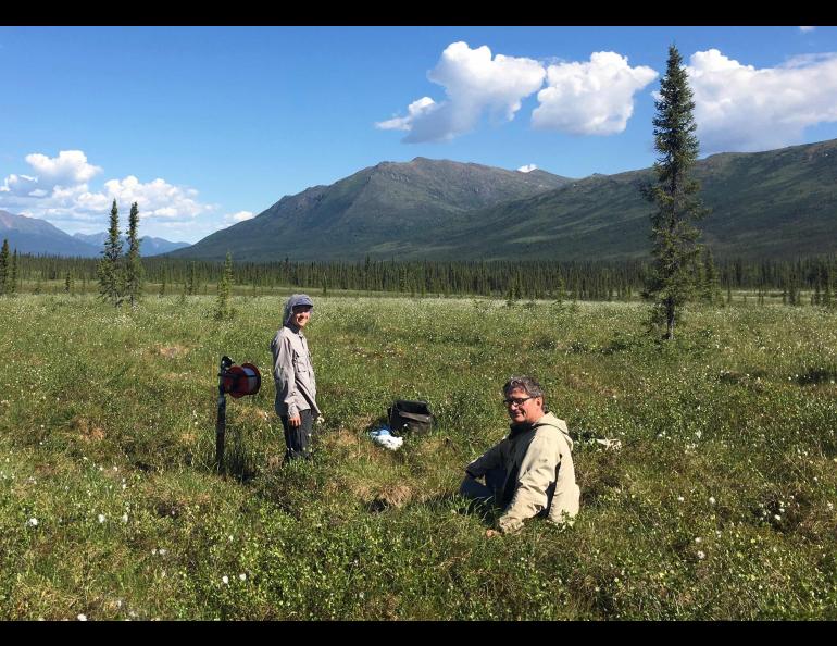 Vladimir Romanovsky and student Jake Eiting work at a borehole site near Coldfoot. At 60 meters, the site is one of the deeper holes of the Geophysical Institute Permafrost Laboratory’s monitoring network. Talik formation has not been observed at this site. Photo by Louise Farquharson.