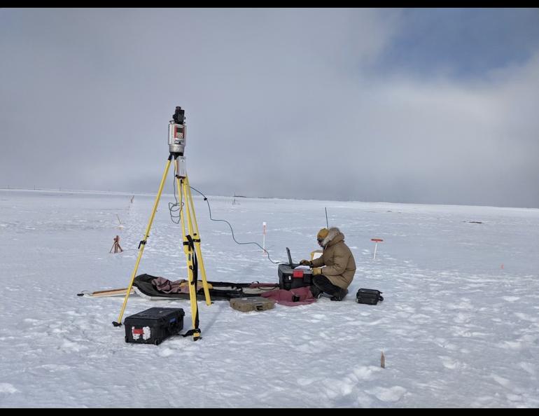 Phillip Wilson on the Terrestrial Lidar Scanner and still wearing a parka in June. Photo by Owen Larson