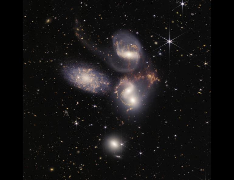 Stephan’s Quintet, a visual grouping of five galaxies, is best known for being prominently featured in the holiday classic film, “It’s a Wonderful Life.” Image courtesy NASA, ESA, CSA, and STScI.