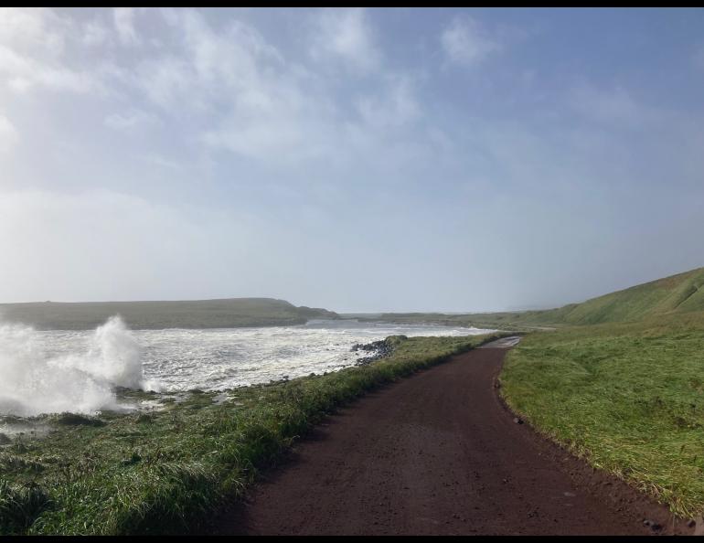 Waves reach a road as the remnants of Typhoon Merbok pass over St. Paul Island. Photo courtesy Chris Maio