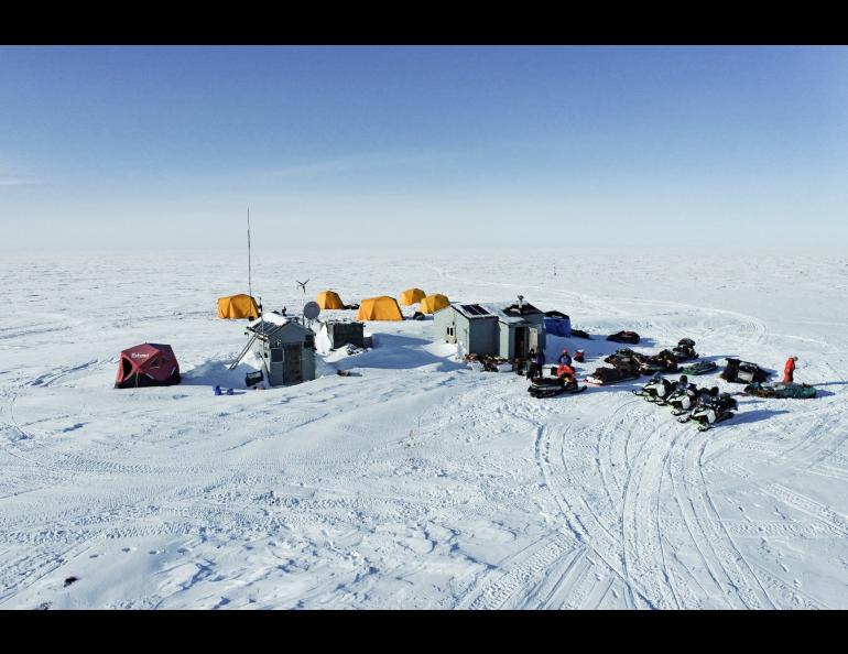 A drone photo of the Teshekpuk Lake Observatory taken during a spring snowmachine traverse in 2022 that included researchers from Germany, Japan, Brazil and the United States. Photo by Ben Jones