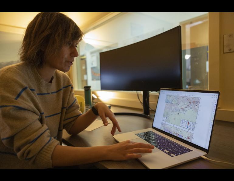Alaska Earthquake Center research seismologist Ezgi Karasözen displays a map of earthquake activity in a computer application named Earthquake. UAF/GI photo by JR Ancheta