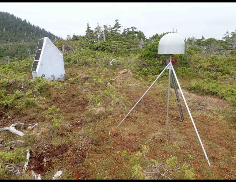 Alaska Volcano Observatory field staff in late August 2023 installed a new GNSS antenna monument and seismic station on the south side of Mount Edgecumbe. The GNSS site consists of 12-foot stainless steel rods driven 7 feet into the ground and welded together. Photo by Max Kaufman.
