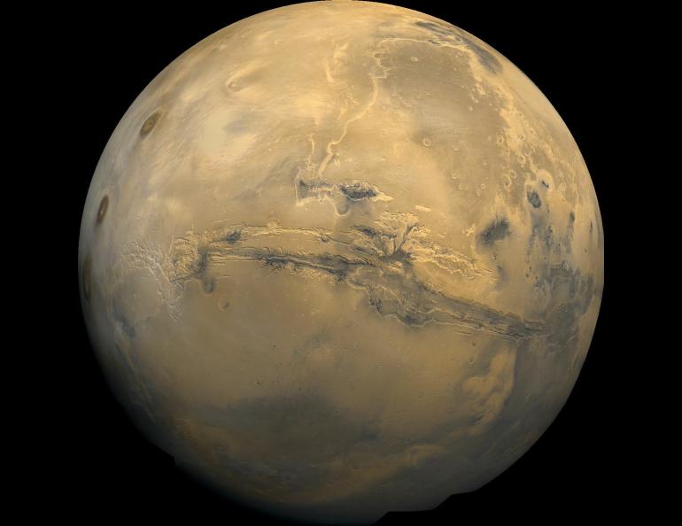 This image is a mosaic of the Valles Marineris hemisphere of Mars in a view similar to that which a person would see from a spacecraft. NASA image processing by Jody Swann/Tammy Becker/Alfred McEwen
