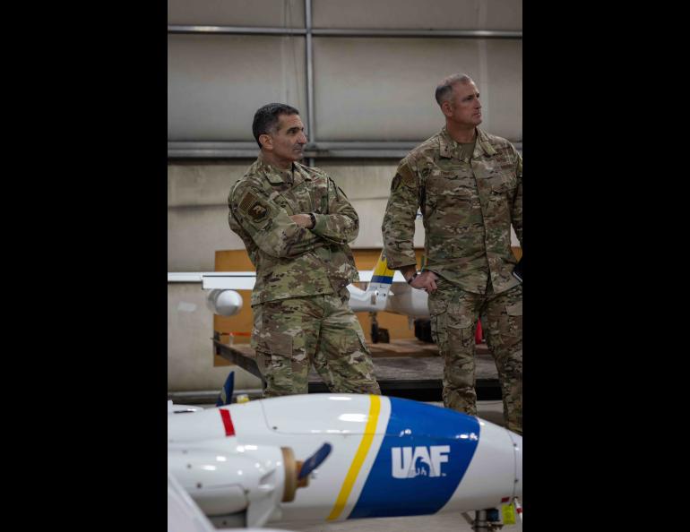 Air Force Lt. Gen. David Nahom, left, commander of the Alaskan Command, visited the hangar of the Alaska Center for Unmanned Aircraft Systems Integration as part of a Geophysical Institute tour on Aug. 30. Nahom oversees all military forces in Alaska. UAF/GI Photo by Courtney Holtzclaw.