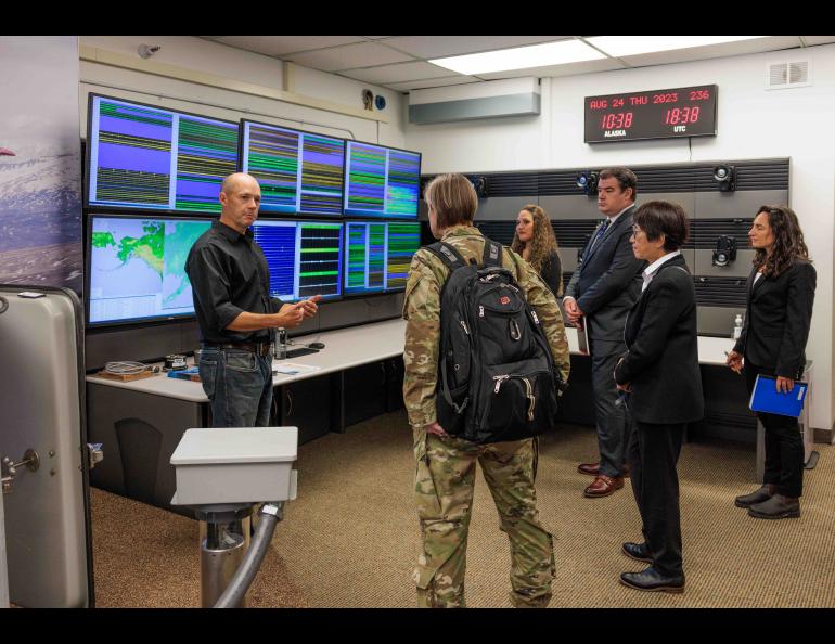 Alaska Earthquake Center Director Michael West explains the center’s operations to a tour group headed by U.S. Undersecretary of Defense Heidi Shyu on Aug. 24. UAF/GI Photo by Courtney Holtzclaw.
