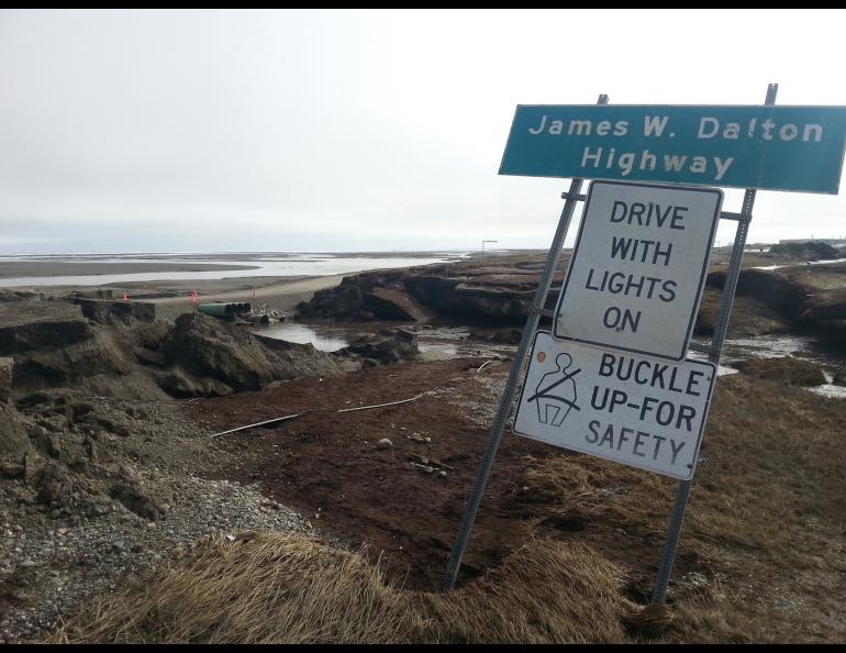 An erosion channel cuts through the Dalton Highway in spring 2015. Such damage closed the highway for several days after the Sagavanirktok River flooded a wide area in northern Alaska.  Photo courtesy of the Alaska Department of Transportation and Public Facilities.