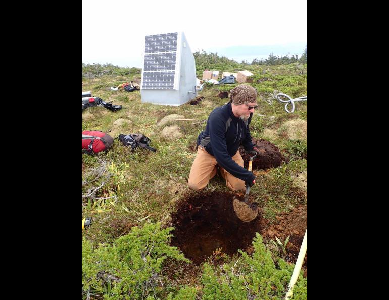 UAF Geophysical Institute associate professor Ronni Grapenthin digs the seismometer hole at a new Alaska Volcano Observatory monitoring site on the northwest side of Mount Edgecumbe in late August 2023. Photo by Max Kaufman.
