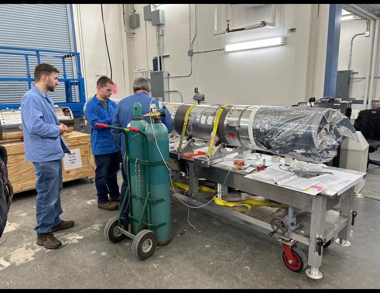 NASA personnel at the Poker Flat Research Range payload assembly area work on the payload for the two-stage rocket for the Dissipation experiment. Photo by Rod Boyce