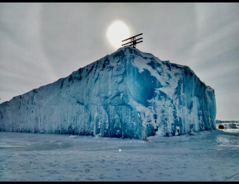A portable interferometric radar unit sits atop an ice island near Utqiaġvik, Alaska. Photo courtesy of Emily Fedders.