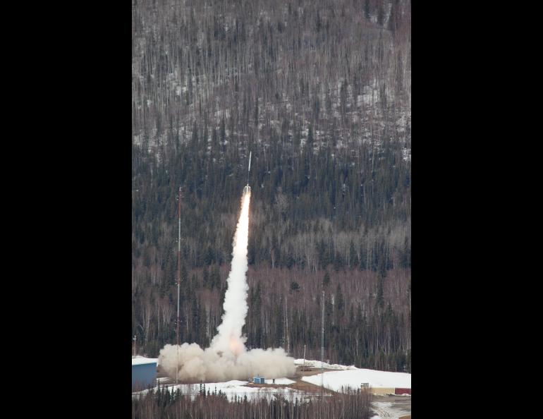 A rocket launches from Poker Flat Research Range on April 17, 2024, carrying the High Resolution Coronal Imager instrument. It was the second of two rockets launched one minute apart from Poker Flat in NASA's new solar flare sounding rocket campaign. NASA photo by Lee Wingfield