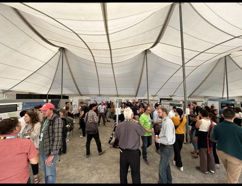 Monday’s outdoor poster session at the International Conference on Permafrost was a combination of science and happy hour. Photo by Rod Boyce