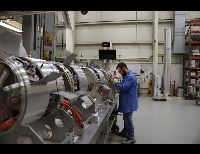 A NASA technician works on the payloads of one of the AWESOME mission’s three rockets at the space agency’s Wallops Flight Facility in Virginia. The rocket and payload components were then shipped to Poker Flat Research Range. Photo by Berit Bland/NASA