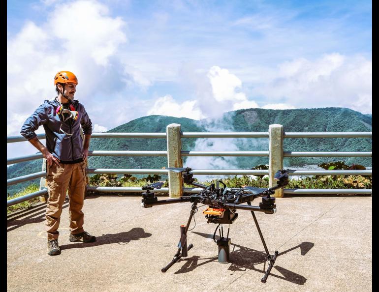 Research assistant professor Társilo Girona of the University of Alaska Fairbanks Geophysical Institute views the Alta X drone at the Poás volcano overlook. Photo by Martina Picciallo 