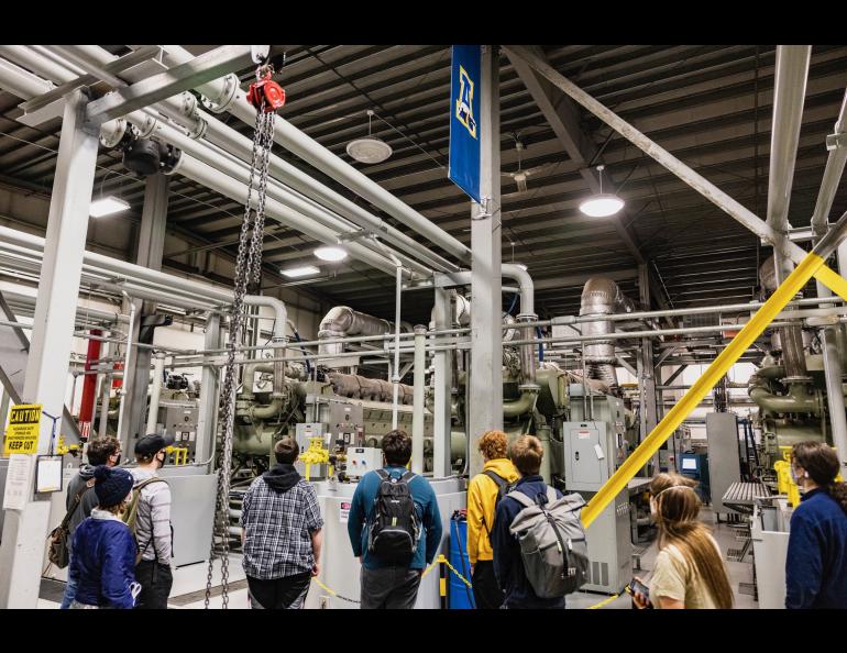 Visitors at the 2022 HAARP open house view the power plant, which consists of five generators. UAF/GI photo