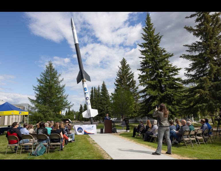 A crowd watches the signing of a memorandum of understanding between the UAF Geophysical Institute and the Alaska Aerospace Corp. UAF/GI photo by Bryan Whitten