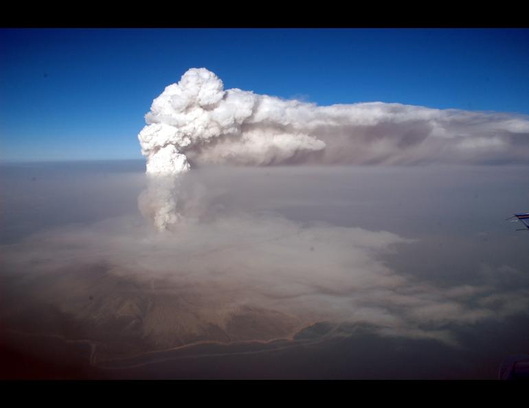 A steam plume with minor ash extends northeast from Augustine Volcano on Jan. 30, 2006. Photo by R.G. McGimsey/Alaska Volcano Observatory/U.S. Geological Survey