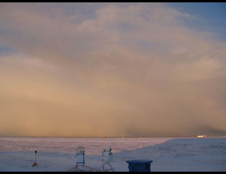 Mixed-phase clouds float near Utqiaġvik on Alaska’s North Slope during the Mixed- Phase Arctic Cloud Experiment field campaign in September 2004. Photo courtesy of the U.S. Department of Energy Atmospheric Radiation Measurement user facility