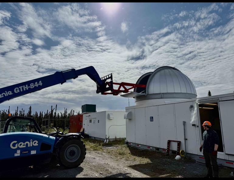 A portion of the new lidar is lifted into the dome at the Subauroral Geophysical Observatory in Gakona, Alaska, in late June 2025.. SAGO also houses the HAARP facility. Photo courtesy of Mike Roddewig
