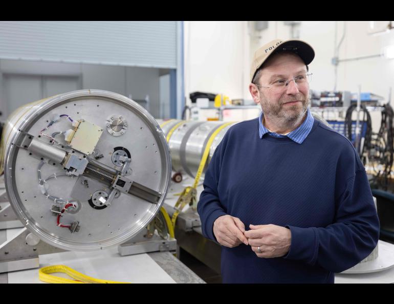 Scott Bailey of Virginia Tech stands with a portion of the rocket for his Polar Night Nitric Oxide, or PolarNOx, mission at Poker Flat Research Range north of Fairbanks. Photo by Bryan Whitten