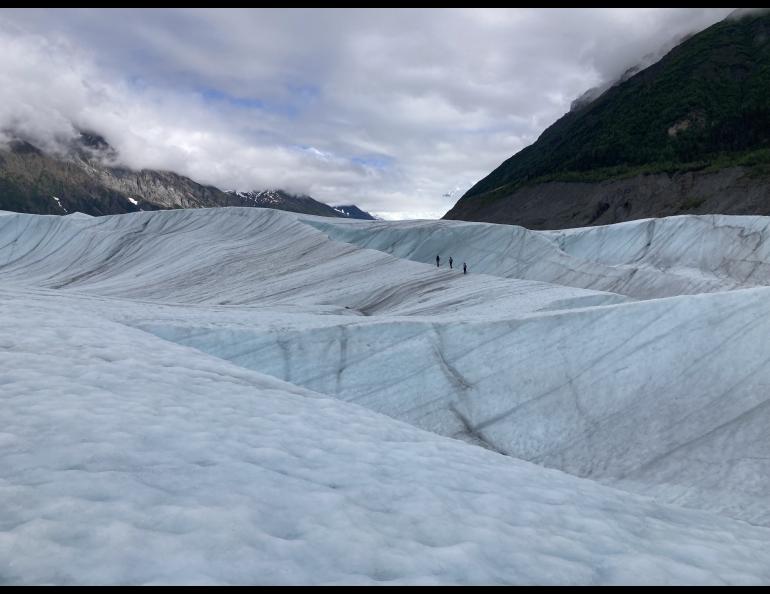 Participants in a 2022 international glaciology summer school walk on Root Glacier near McCarthy, Alaska, in 2022. Photo by Albin Wells