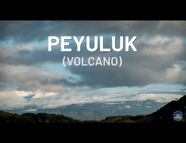 Landscape photo of a large volcano with the words "PEYULUK (VOLCANO)" superimposed on the image