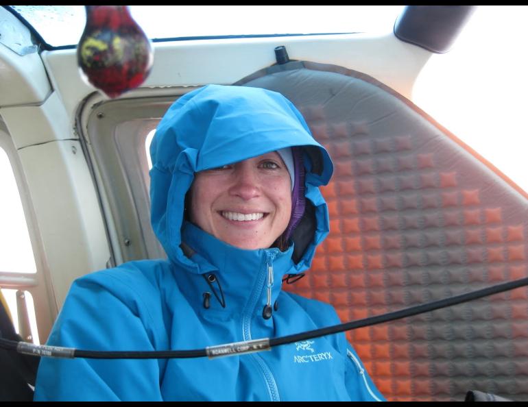 Volcano researcher Taryn Lopez smiles during her 48-hour wait inside a stranded Jet Ranger helicopter on top of Mount Mageik. Photo courtesy of Taryn Lopez